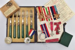 AN ARCHIVE OF WORLD WAR TWO MEDALS IN ORIGINAL BOX OF ISSUE, with issue slip, attributed to HRJ WOOD