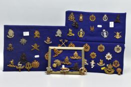 MILITARY CAP BADGES, three pads and some loose thirty nine in number, inc RA, MGC, The Rangers, Tank