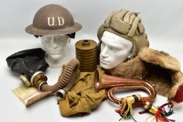 A BOX CONTAINING MILITARY ITEMS AS FOLLOWS, WW2 era Canvas flying helmet, with sewn in ear phones