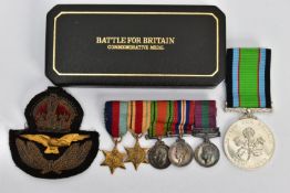 A BOXED BATTLE OF BRITAIN COMMEMORATIVE MEDAL, together with a group of five miniature medals to