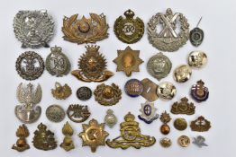 A BOX OF ASSORTED MILITARY BADGES, to include, Camerons London Scottish, Prince of Wales,