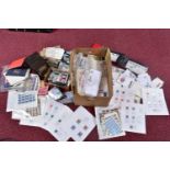 LARGE UNTIDY ACCUMULATION OF STAMPS ON CARDS, loose in approval booklets and as duplicated first day