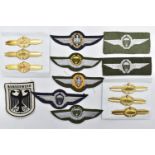 TWO SETS OF EAST GERMAN(DDR) PANZER TANK QUALIFICATION BADGES, gold coloured with I,II,III