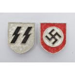 A PAIR OF GERMAN 3RD REICH TROPICAL HELMET DECAL BADGES. SS & SWASTIKA DESIGN, both are fixed by way