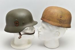 A GERMAN 3rd REICH PERIOD FIELD POLIZEI STEEL HELMET, with twin decals, and complete with liner band