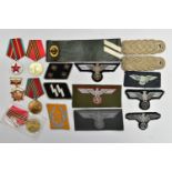 A BOX OF GERMAN WW2 INSIGNIA, SS, Luftwaffe, Breat Eagles etc, (Reproductions) shoulder boards,