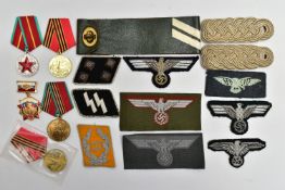 A BOX OF GERMAN WW2 INSIGNIA, SS, Luftwaffe, Breat Eagles etc, (Reproductions) shoulder boards,
