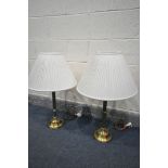 A PAIR OF BRASS COLUMN TABLE LAMPS, with fabric shades, height 72cm