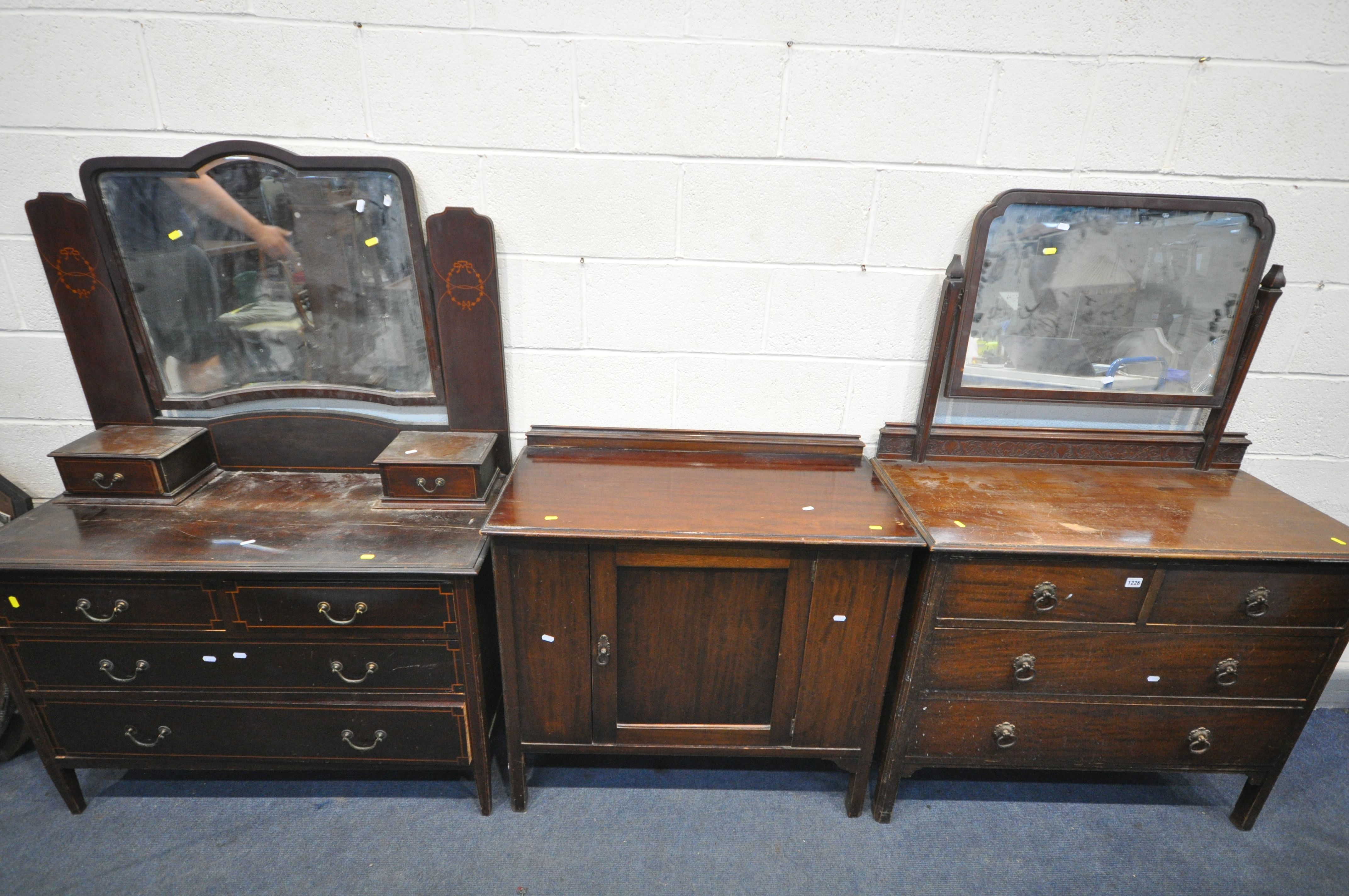 TWO EARLY 20TH CENTURY DRESSING CHESTS, with single swing mirrors, and four drawers, width 107cm x