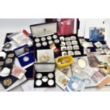 A LARGE AND HEAVY BOX OF COINS AND COMMEMORATIVES, to include a Royal mint 8x £5 Silver proof
