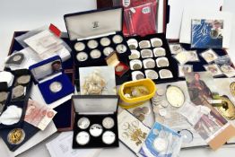 A LARGE AND HEAVY BOX OF COINS AND COMMEMORATIVES, to include a Royal mint 8x £5 Silver proof