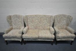A THREE PIECE FLORAL LOUNGE SUITE, comprising a two seater sofa, length 122cm, and two armchairs (