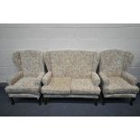 A THREE PIECE FLORAL LOUNGE SUITE, comprising a two seater sofa, length 122cm, and two armchairs (