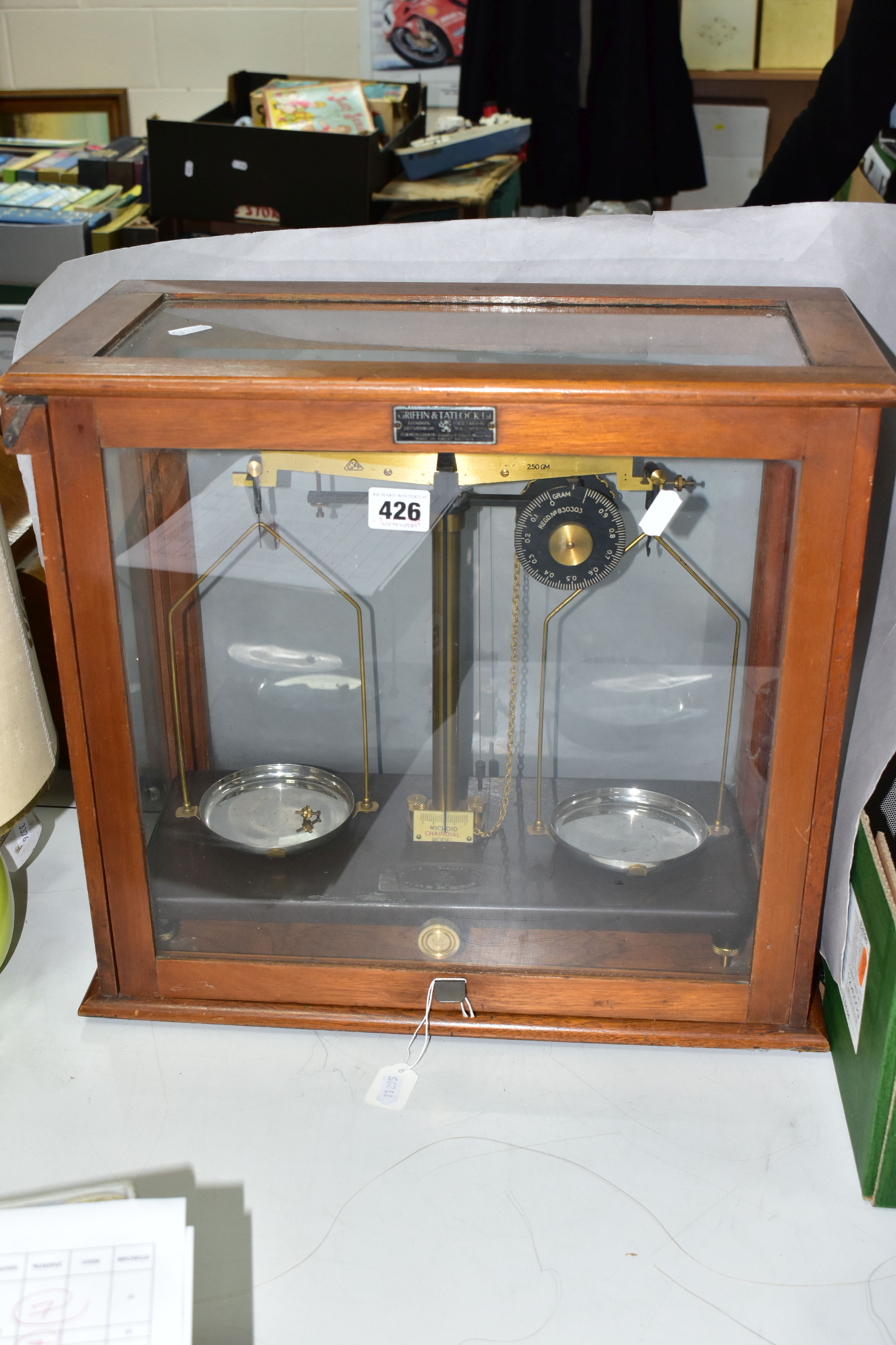 AN OAK CASED SET OF GRIFFIN & TATLOCK LTD SCIENTIFIC SCALES, the Bakelite base marked with maker's