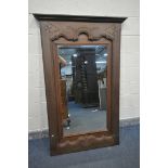 A 19TH CENTURY WALNUT FRENCH WALL MIRROR, 111cm x 176cm (condition:-some veneer lifting and
