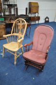 A BEECH WINDSOR ARMCHAIR (condition:-fluid stains) and a mahogany rocking chair (2)