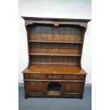 A REPRODUCTION GEORGIAN STYLE OAK DRESSER, with two shelves, over a base with three drawers, two