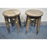 A PAIR OF GEORGIAN OAK CIRCULAR STOOLS, with dish seat, on square legs, united by a cross stretchers