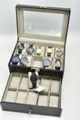 A WATCH DISPLAY CASE WITH WRISTWATCHES, a faux black leather display case, with twenty storage