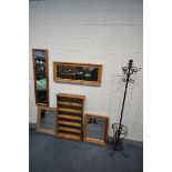 A WROUGHT IRON COAT/HAT STAND, with an umbrella stand, height 182cm, a slim pine bookcase with