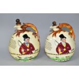 TWO CROWN DEVON JOHN PEEL MUSICAL FLASKS, with wooden stoppers, relief moulded scenes and handles in