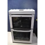 A ZANUSSI ZCV550MWC ELECTRIC COOKER measuring width 55cm x depth 65cm x height 90cm (UNTESTED)