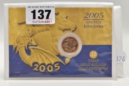 A ROYAL MINT 2005 CARDED 22CT GOLD HALF SOVEREIGN, the reverse designed by Timothy Noad for a single