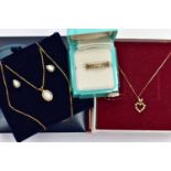 TWO PENDANT NECKLACES, EARRINGS AND TWO RINGS, to include an earring and pendant necklace set, the