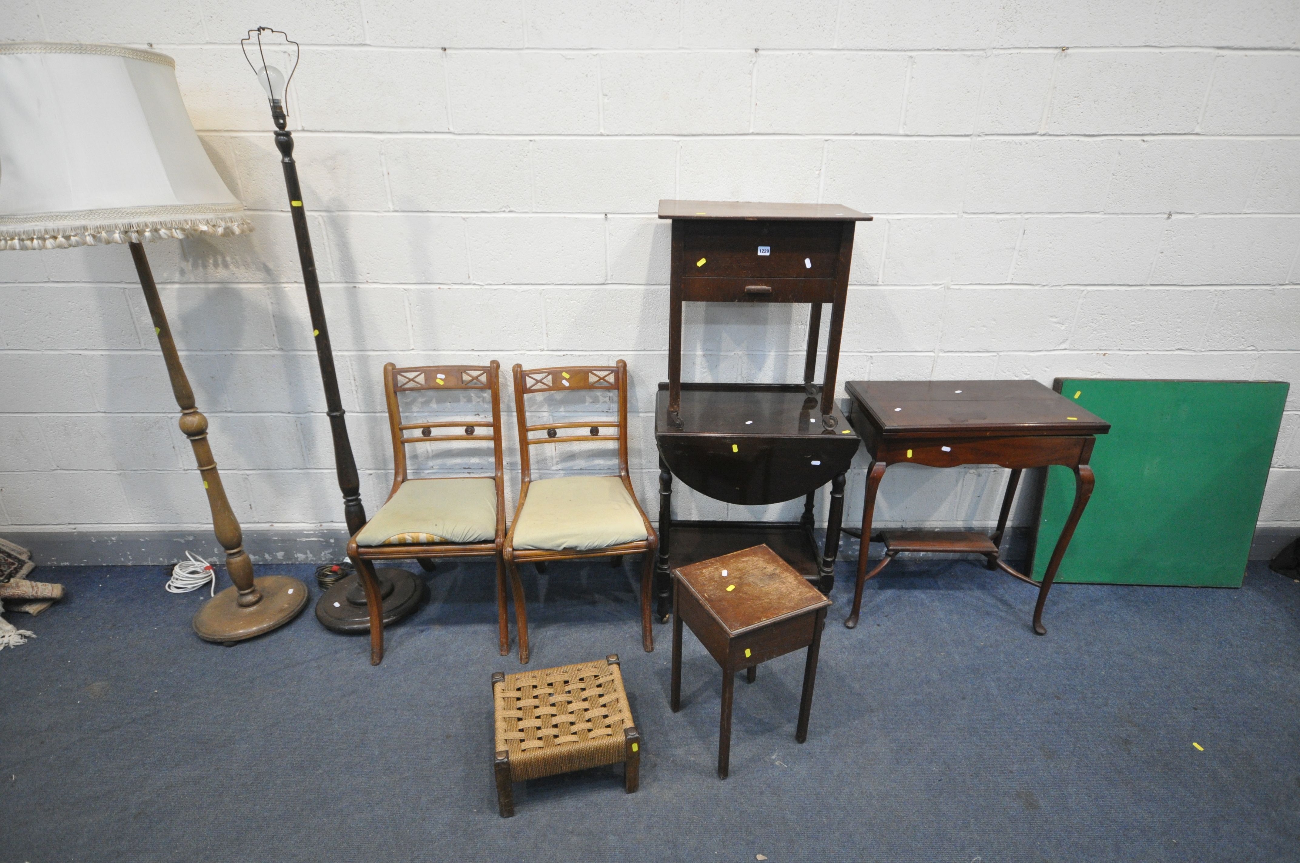 A EDWARDIAN MAHOGANY CARD TABLE, with a green baize playing, on cabriole legs, united by a cross