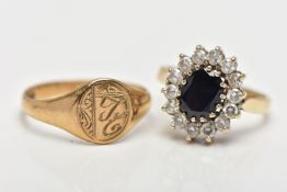 A 9CT GOLD SIGNET RING AND A YELLOW METAL GEM SET CLUSTER RING, the first a 9ct gold signet ring