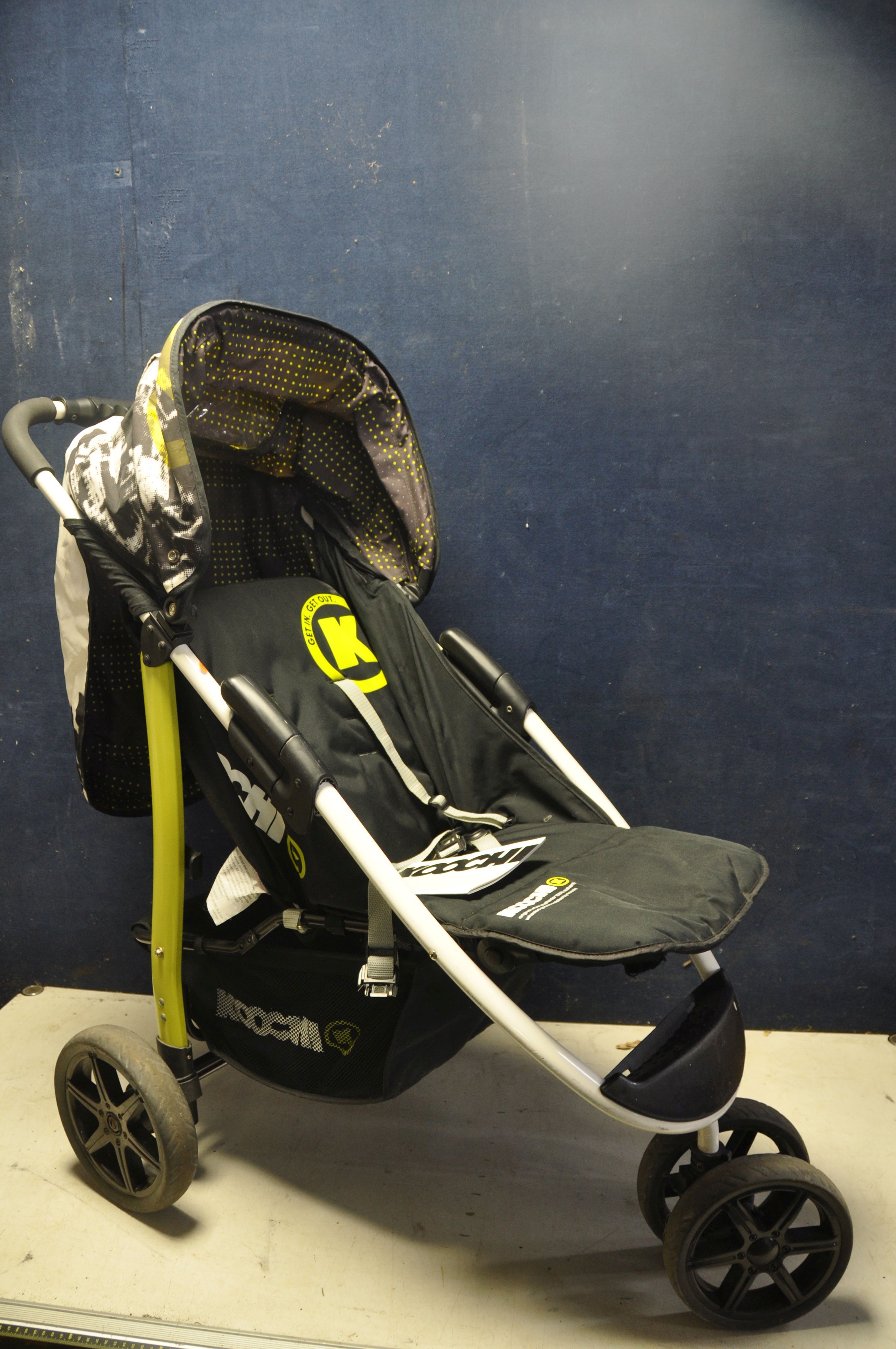 A KOOCHI PUSHMATIC PUSHCHAIR. three wheeled pushchair along with a Mothercare safari stroller, a