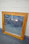 A LARGE RECLAIMED HARDWOOD WALL MIRROR, made up of multiple strips to the frame, 135cm x 135cm