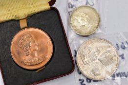 A SMALL PACKAGE CONTAINING A BRONZE MEDAL FOR ELIZABETH II CORONATION, In box of issue with a five