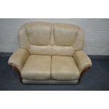 A ROSIN CREAM LEATHERETTE UPHOLSTERED TWO SEATER SOFA, length 144cm (condition - some
