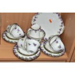 A TWENTY ONE PIECE ROYAL DOULTON VIOLETS H3747 TEA SET, comprising a cream jug, a sugar bowl, a cake