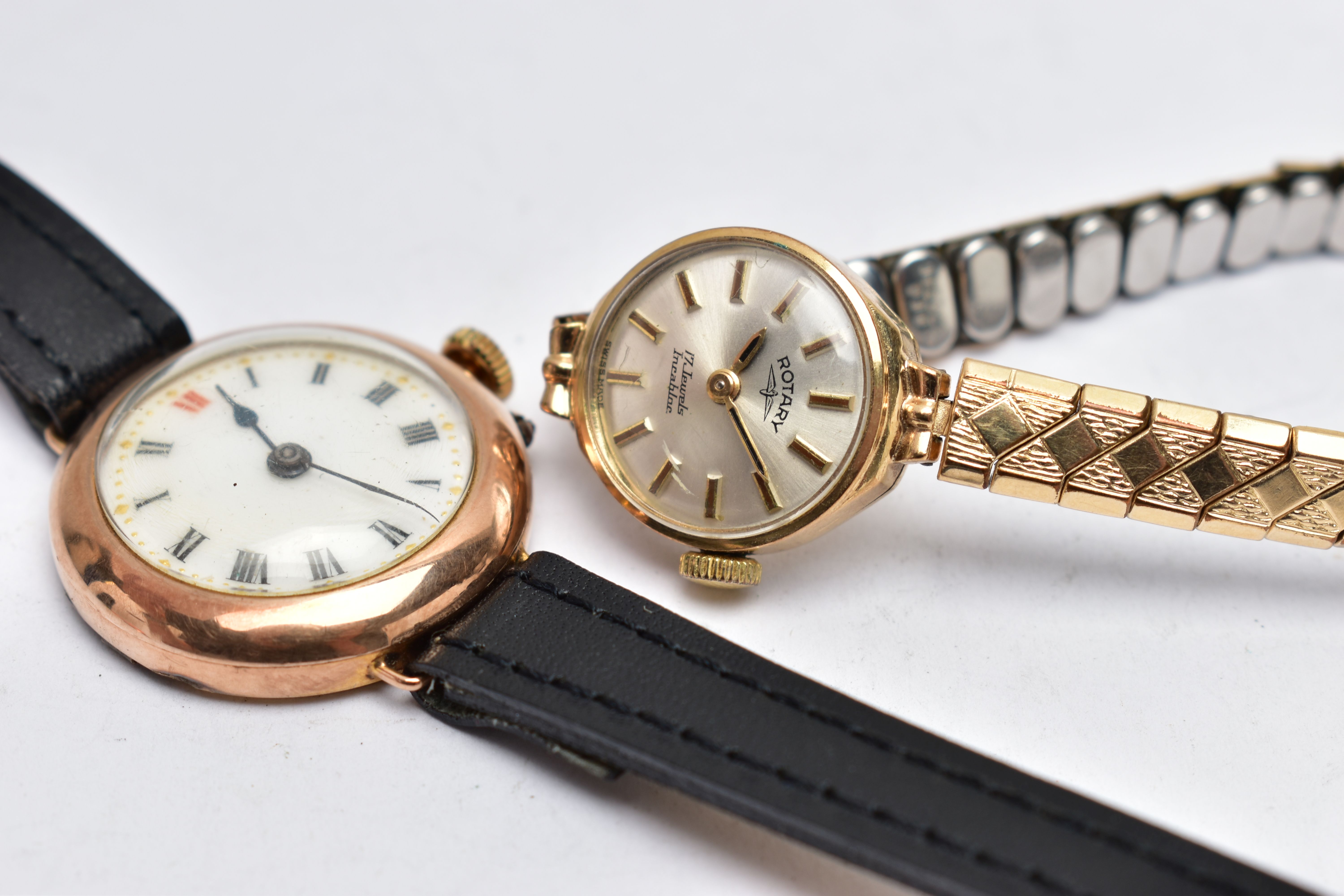 TWO LADIES 9CT GOLD WRISTWATCHES, the first a manual wind watch with a round white dial, Roman
