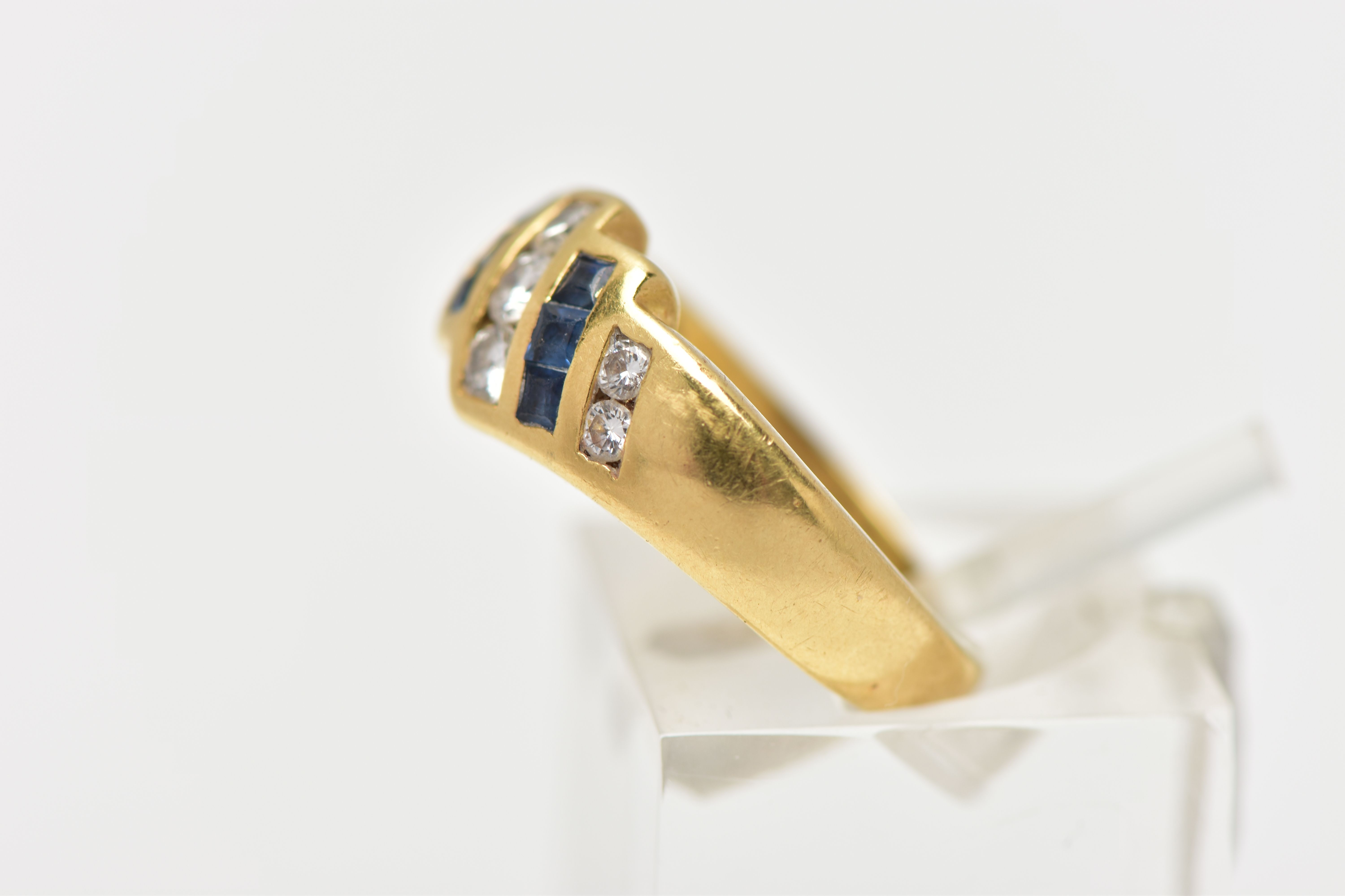 A YELLOW METAL SAPPHIRE AND DIAMOND DRESS RING, of geometric design, the principal brilliant cut - Image 2 of 4