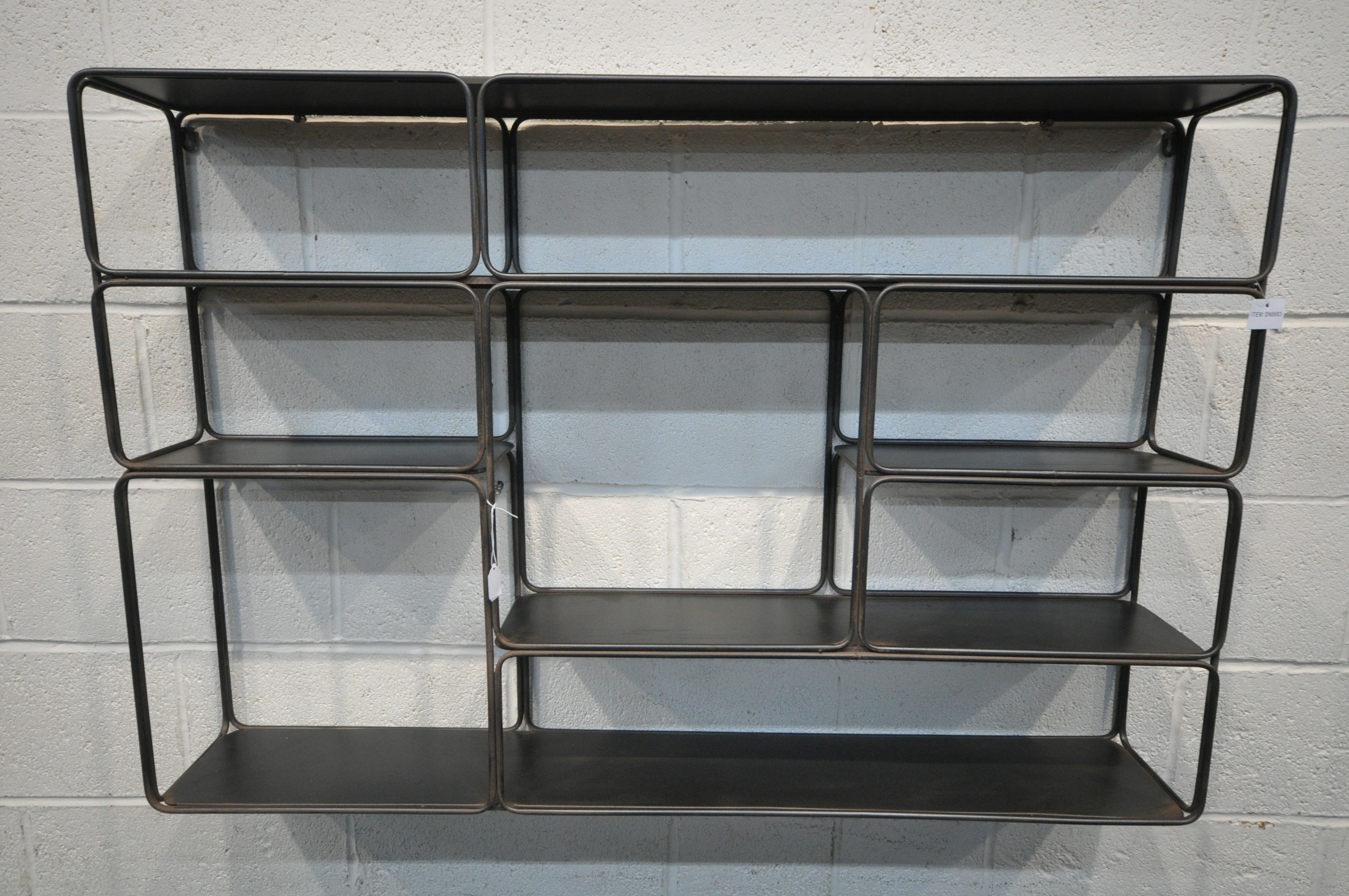 AN INDUSTRIAL METAL HANGING GEOMETRIC WALL SHELF, with five shelves, and eight sections, length