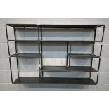 AN INDUSTRIAL METAL HANGING GEOMETRIC WALL SHELF, with five shelves, and eight sections, length
