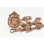 AN EARLY 20TH CENTURY 9CT GOLD ALBERT CHAIN AND FOB, a rose gold graduated curb link chain, fitted