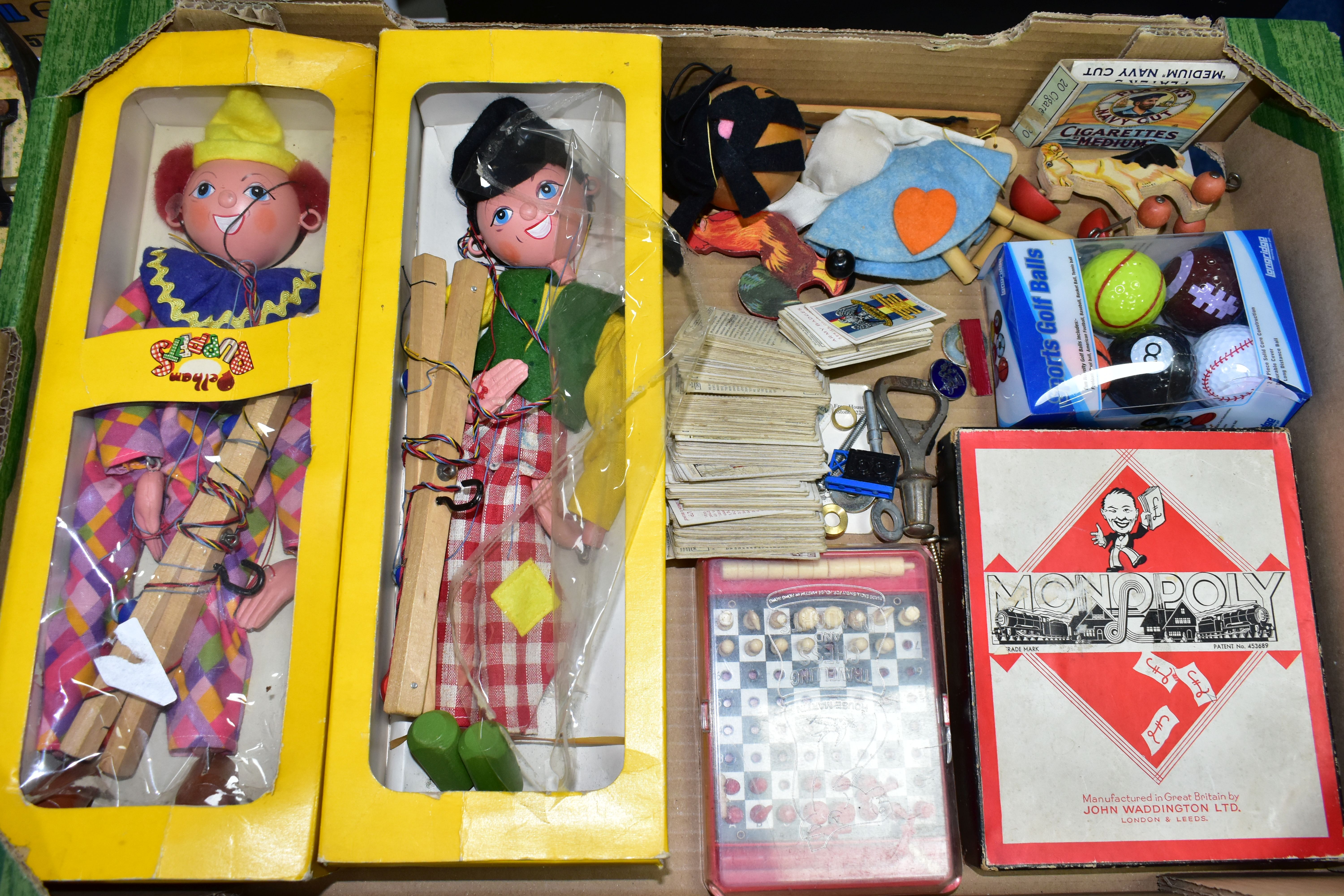 PELHAM PUPPETS AND SUNDRY GAMES ETC, comprising of 'Dutch Boy' and 'Clown', both with distressed