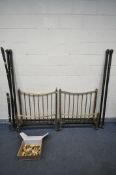 TWO 19TH CENTURY BRASS SPINDLED SINGLE BEDSTEADS, with irons (condition:-partially dismantled,