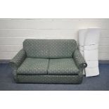 A GREEN UPHOLSTERED TWO SEATER SOFA BED, and a mattress topper (condition - stains to mattress) (2)