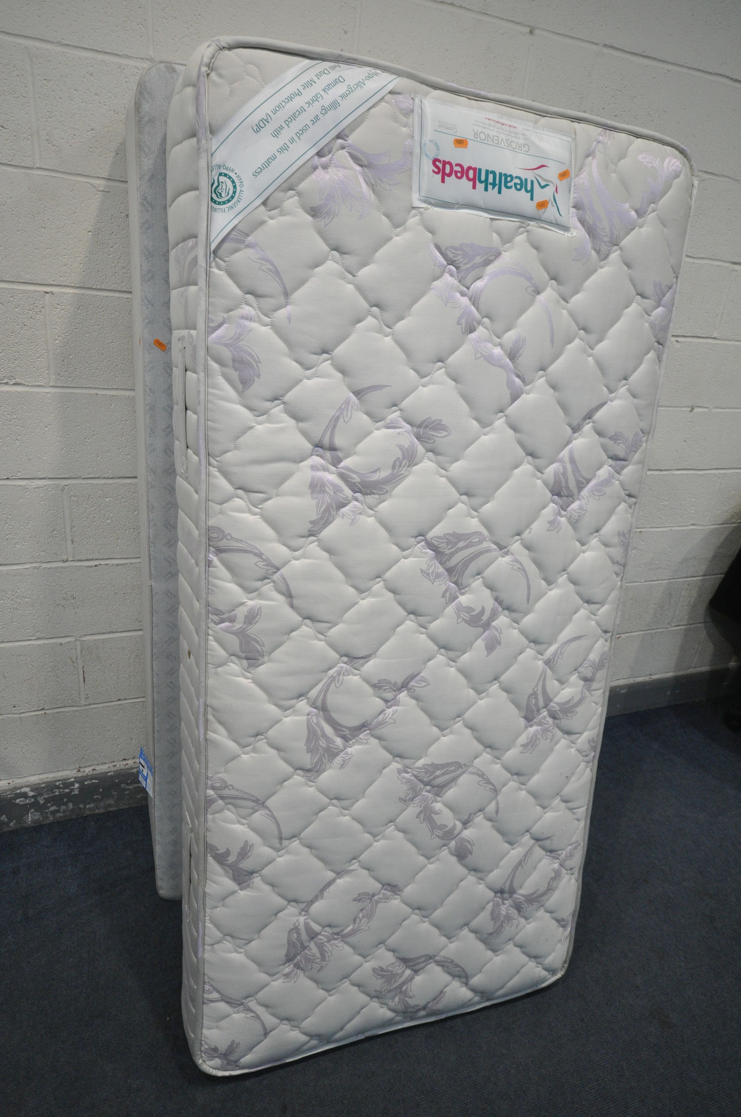 A HEALTHBEDS SINGLE DIVAN BED AND MATTRESS