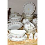 A SIXTY SIX PIECE MINTON SPRING BOUQUET DINNER SERVICE, comprising two tureens, an open vegetable