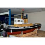 A RADIO CONTROL MODEL OF A TUG BOAT 'KELTY', of fibreglass, wood and plastic construction, fitted