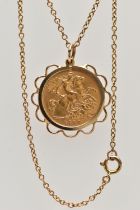 A MOUNTED HALF SOVEREIGN PENDANT, a 1910 half sovereign depicting George and the dragon, King Edward