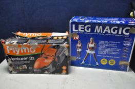 A FLYMO VENTURER32 LAWNMOWER in original box (UNTESTED) along with a JJB leg magic multi exercise