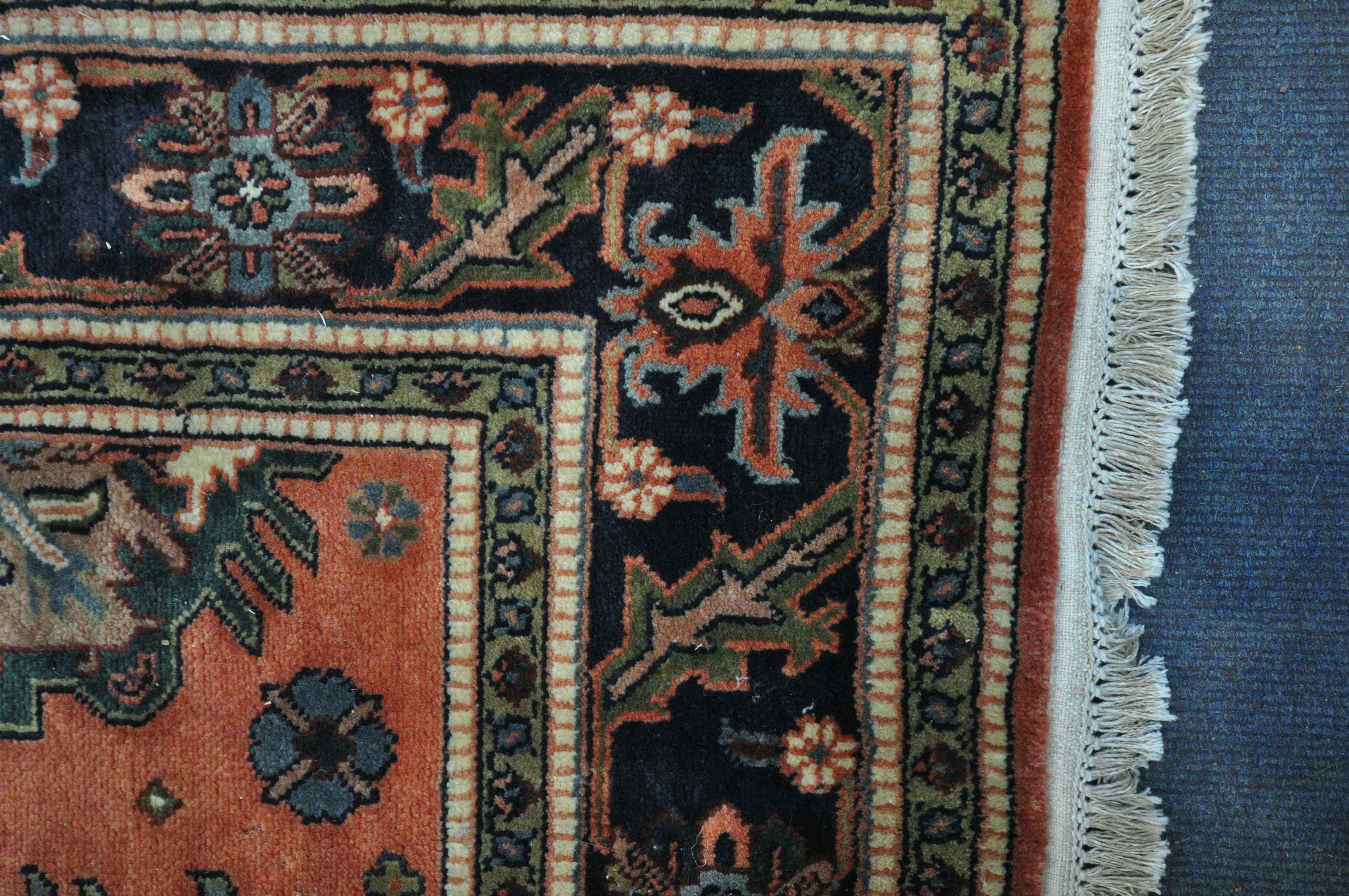 A 20TH CENTURY KULA RUG, with a red field, 250cm x 157cm, along with a gold floral rug, 215cm x - Bild 4 aus 6