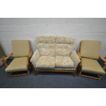 A CINTIQUE ELM TWO SEATER SETTEE, and a pair of Ercol pine armchairs (3)